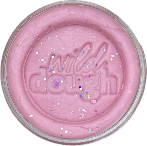 Pink dough in a container with 'willah dough' branding on a white background