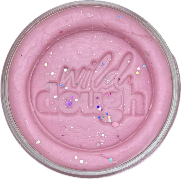 Pink dough in a container with 'willah dough' branding on a white background