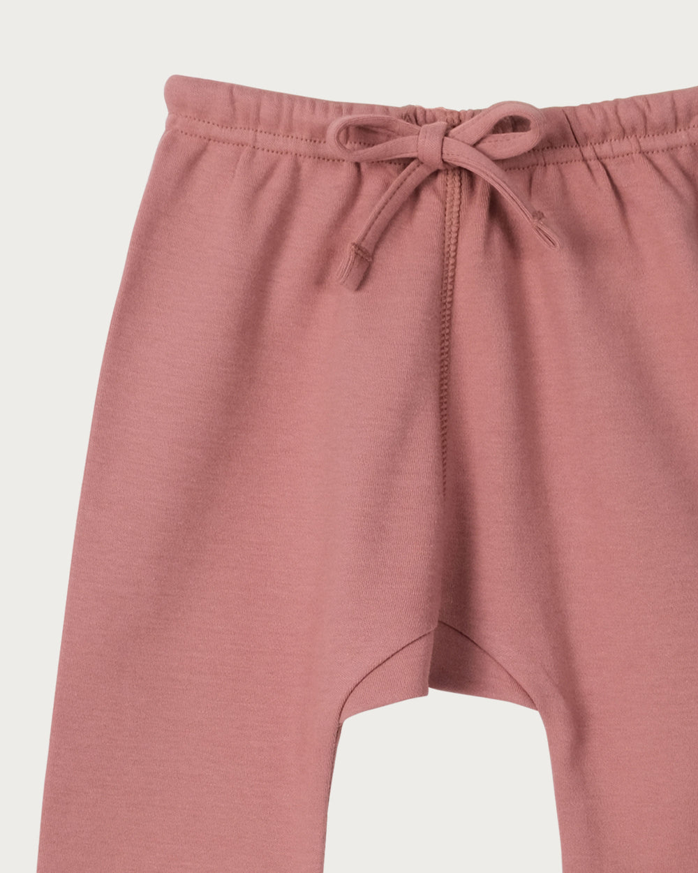 Babu drop crutch pants are made from soft organic cotton,  designed for comfort, movement, and everyday wear. Available from www.thecollectivenz.com