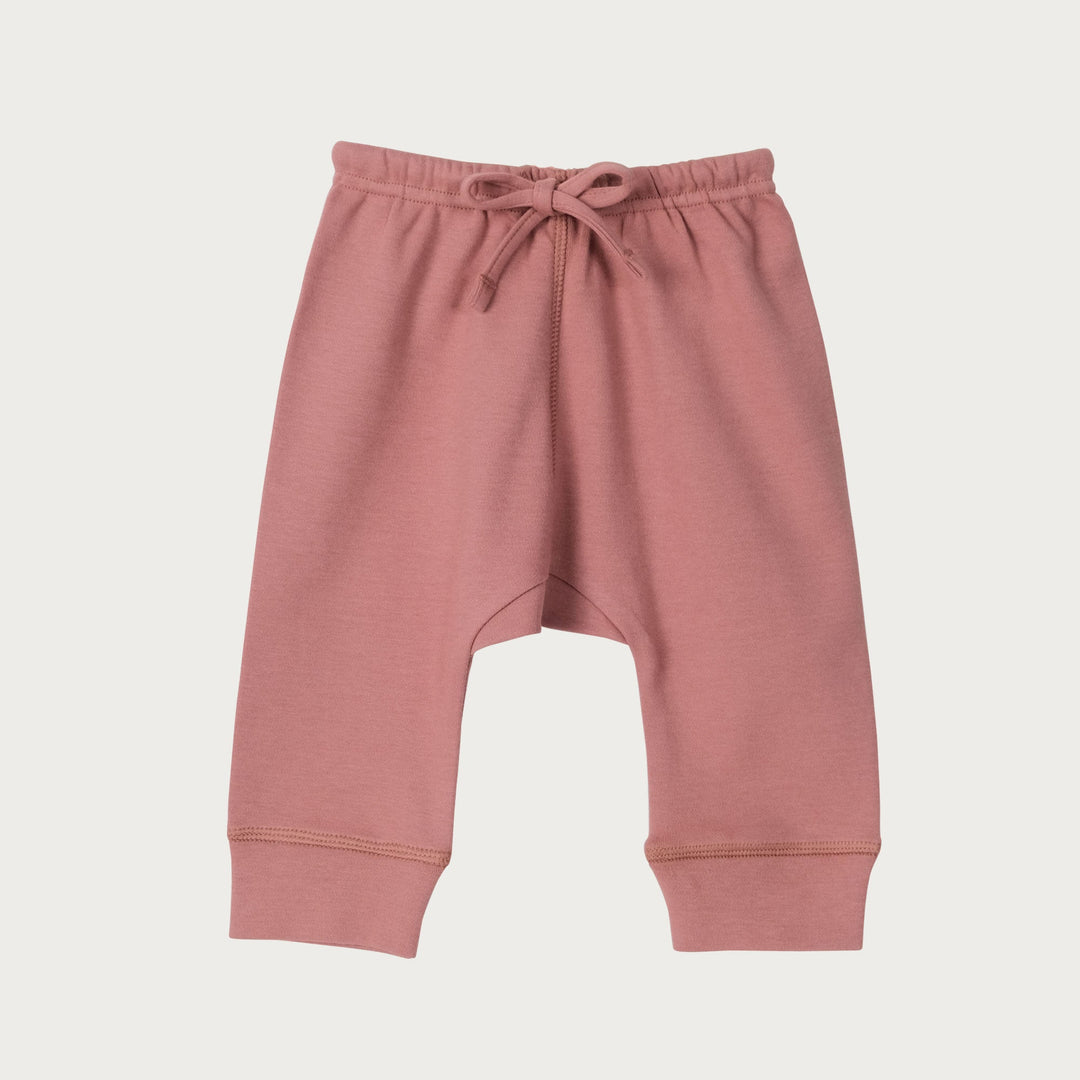 Babu drop crutch pants are made from soft organic cotton,  designed for comfort, movement, and everyday wear. Available from www.thecollectivenz.com