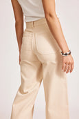 Eb & Ive Beige pants worn by a person on a plain background