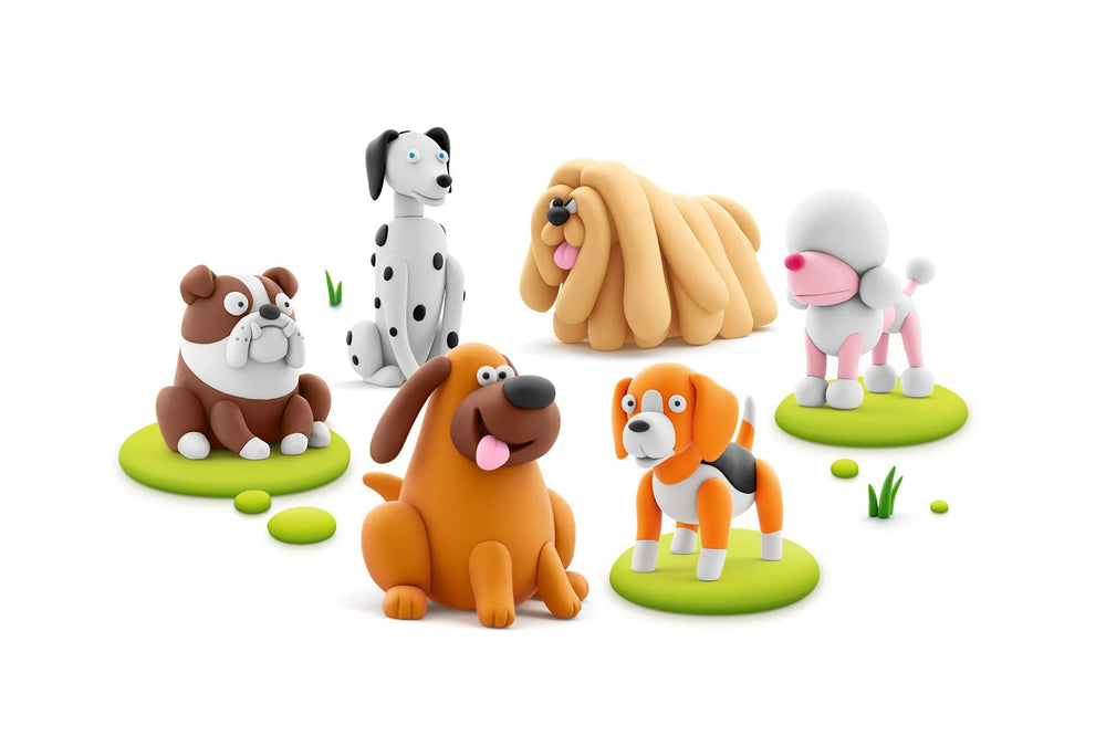 Set of colorful dog figurines on a white background