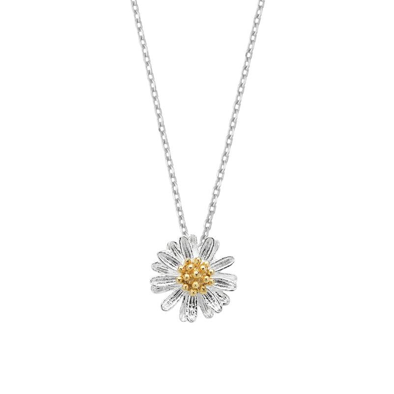 Daisy-shaped necklace with gold center on a white background