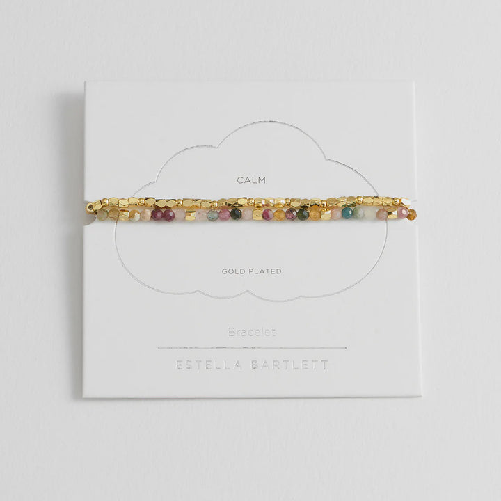Multicolored hair tie on a white card with 'Gold Planet' branding on a light gray background
