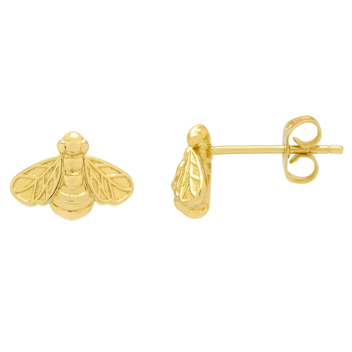Gold bee-shaped earrings on a white background