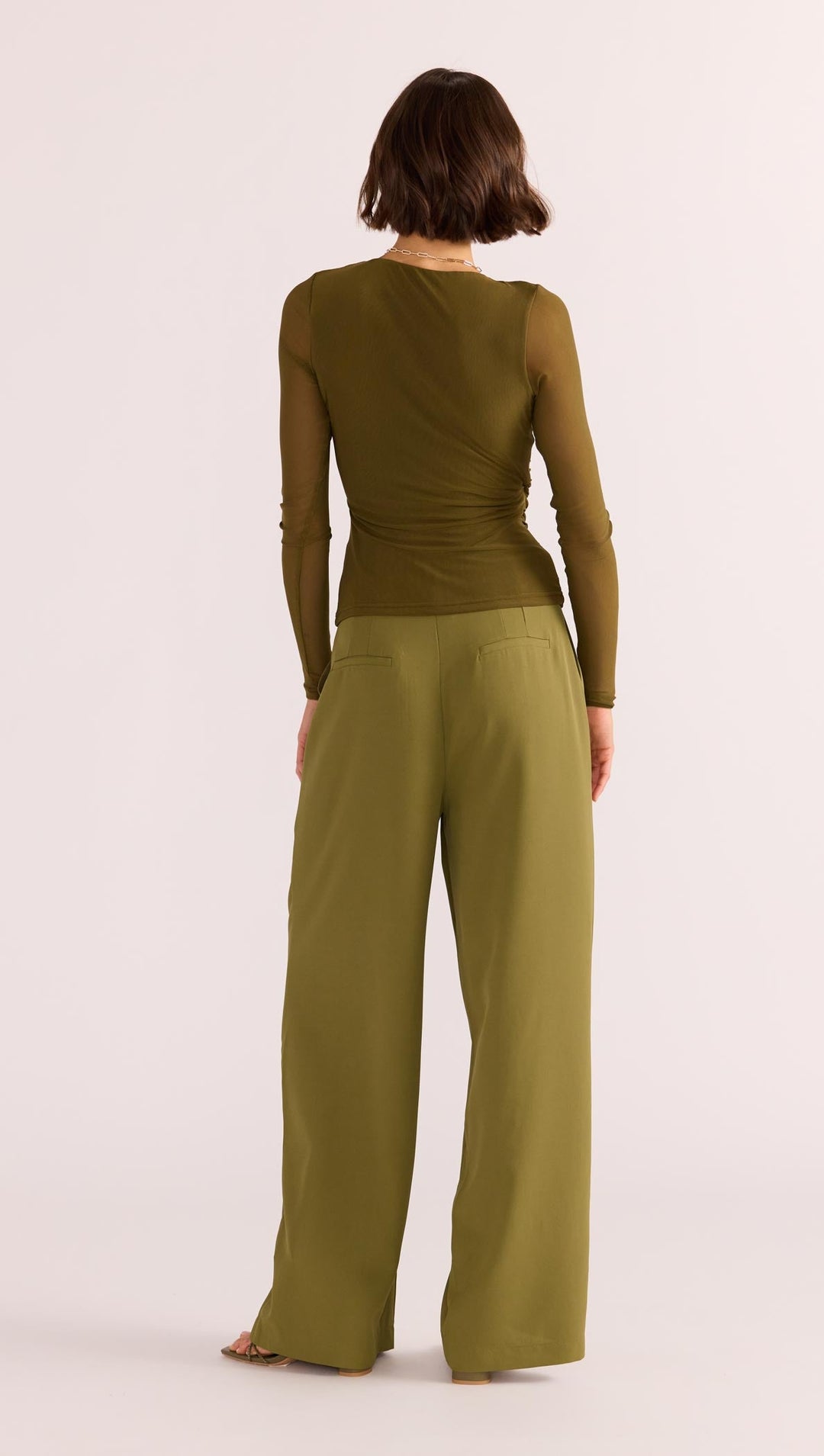 The Elodie Mesh Wrap Top by MINKPINK will easily become part of your capsule wardrobe. Available from www.thecollectivenz.com