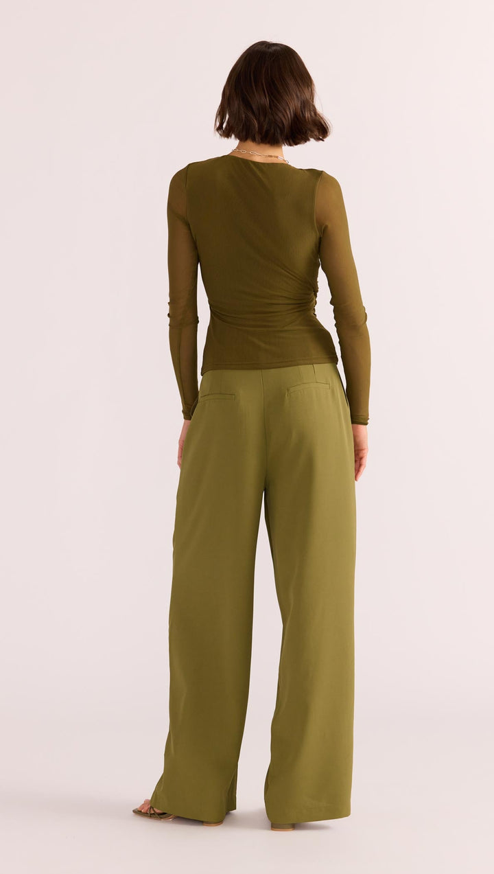 The Elodie Mesh Wrap Top by MINKPINK will easily become part of your capsule wardrobe. Available from www.thecollectivenz.com