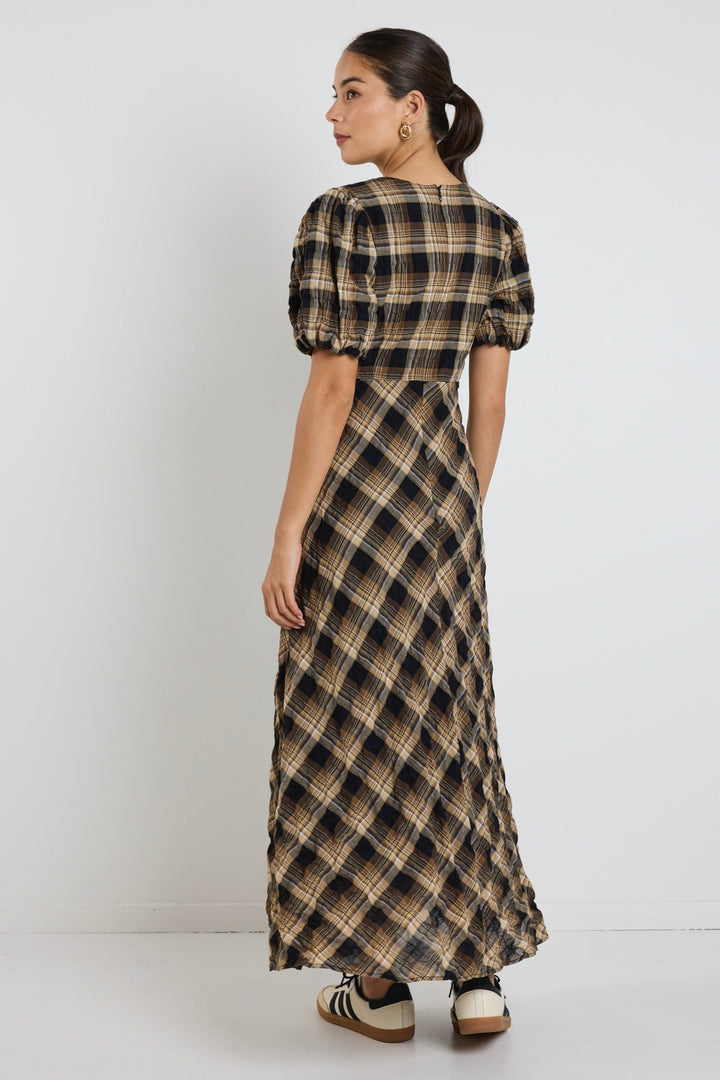 The encore caramel check dress brings easy charm and a little drama to your wardrobe.  Available from www.thecollectivenz.com