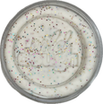 White cream with colorful sprinkles in a round container on a white background