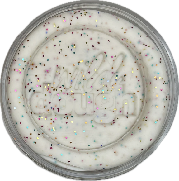 White cream with colorful sprinkles in a round container on a white background