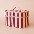 Fox & Fallow Striped makeup bag with gold zipper on a beige background