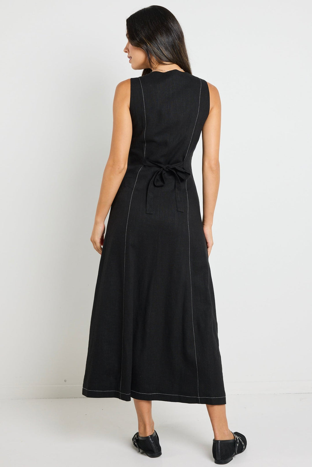 The perfect dress to feel put together immediately, the Guide Black Maxi Vest Dress, available from www.thecollectivenz.com