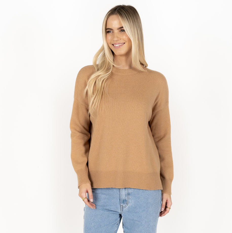 Cosy up in the beautiful Asha Jumper. This lightweight wool jumper will keep you warm and cozy in the cooler months with her non itchy wool blend. Available from www.thecollectivenz.com