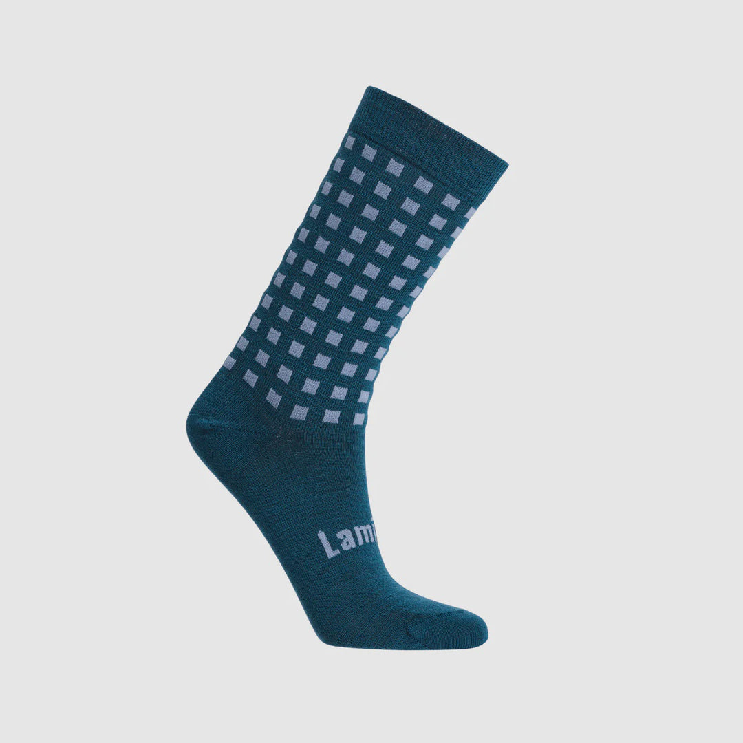 Blue sock with white checkered pattern on a white background