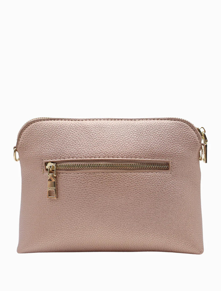 Our Hudson Cross Body Bag combines style and function with two removable straps: a classic PU strap with gold chain and a playful striped webbing strap. Available from www.thecollectivenz.com