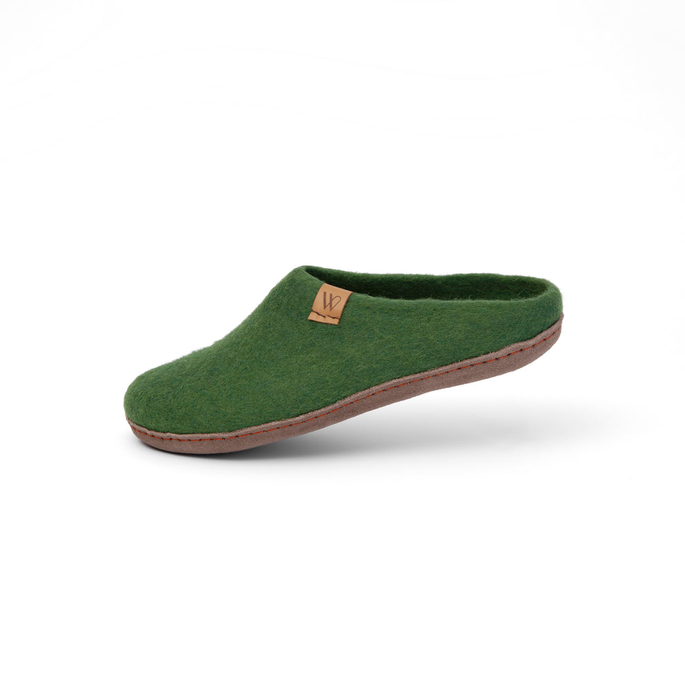 Woolfi Suffolk slippers feature modern and sleek in design our slip-on slipper is our most popular and versatile of our range. Warm and cosy for year-round comfort. Available from www.thecollectivenz.com