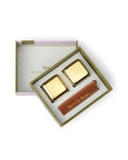 Gold and brown items in a box with 'here's how' text on a white background