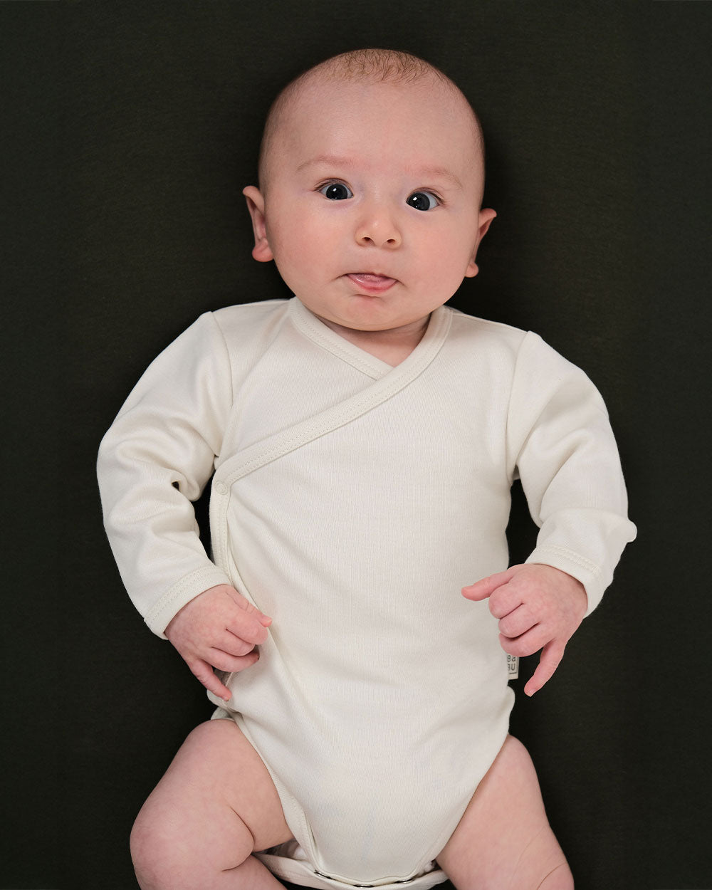 Babu kimono bodysuits are soft, breathable, and designed for easy dressing, a must-have for newborns. Made from premium organic cotton, it provides a gentle, cosy layer against delicate skin. Available from www.thecollectivenz.com