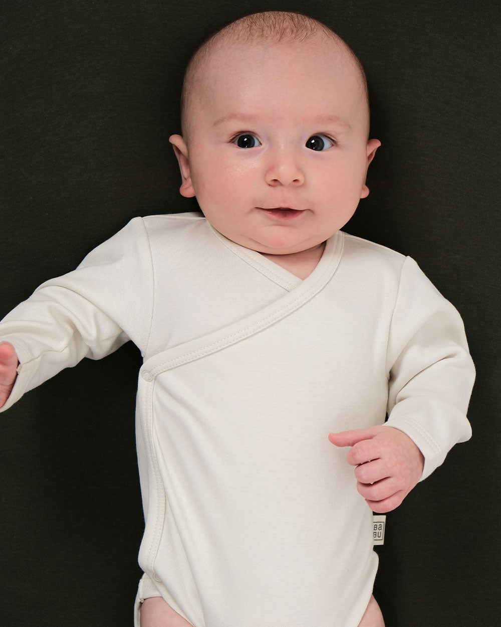 Babu kimono bodysuits are soft, breathable, and designed for easy dressing, a must-have for newborns. Made from premium organic cotton, it provides a gentle, cosy layer against delicate skin. Available from www.thecollectivenz.com