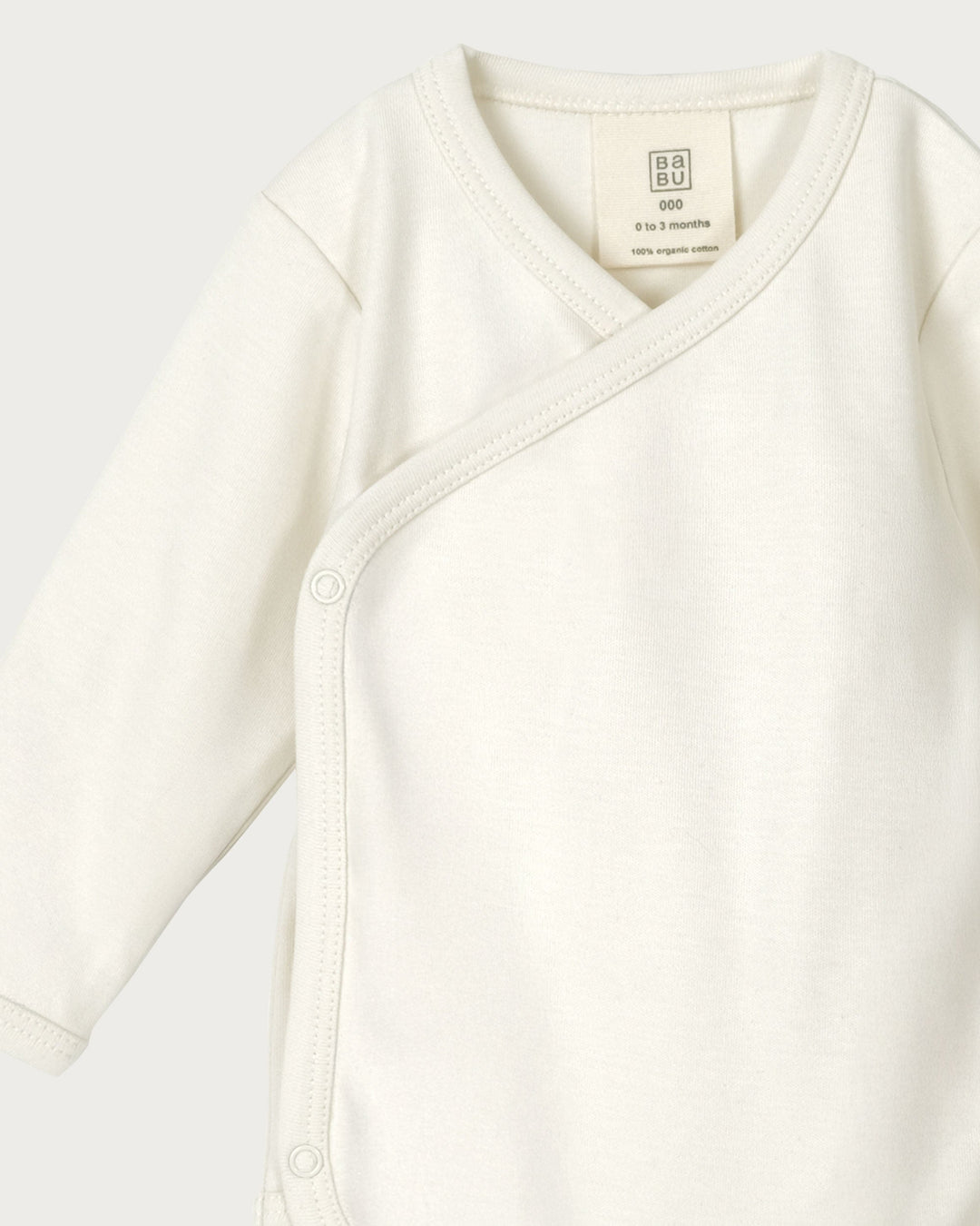 Babu kimono bodysuits are soft, breathable, and designed for easy dressing, a must-have for newborns. Made from premium organic cotton, it provides a gentle, cosy layer against delicate skin. Available from www.thecollectivenz.com