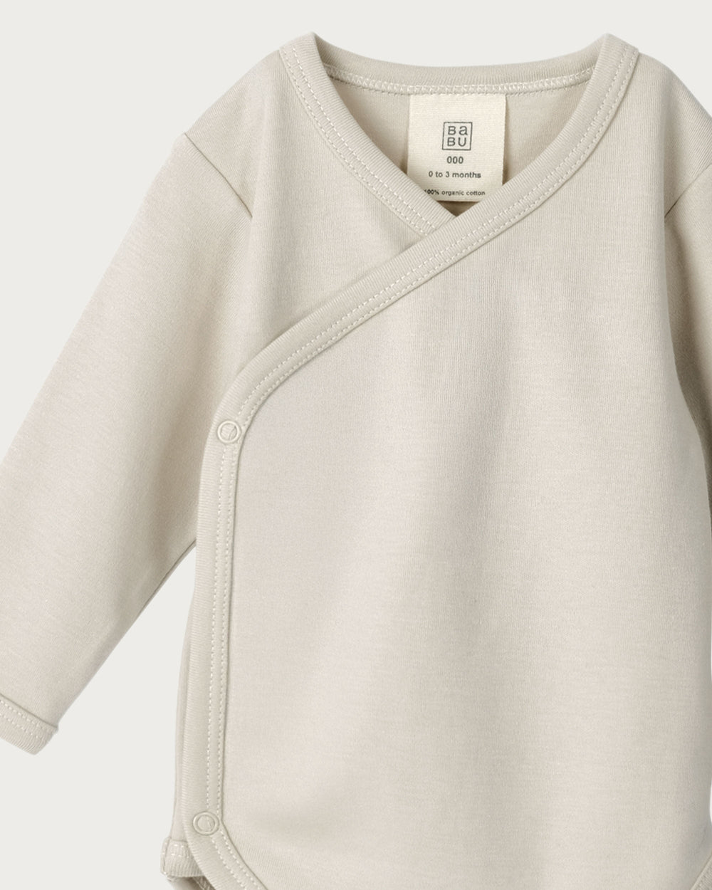 Babu kimono bodysuits are soft, breathable, and designed for easy dressing, a must-have for newborns. Made from premium organic cotton, it provides a gentle, cosy layer against delicate skin. Available from www.thecollectivenz.com