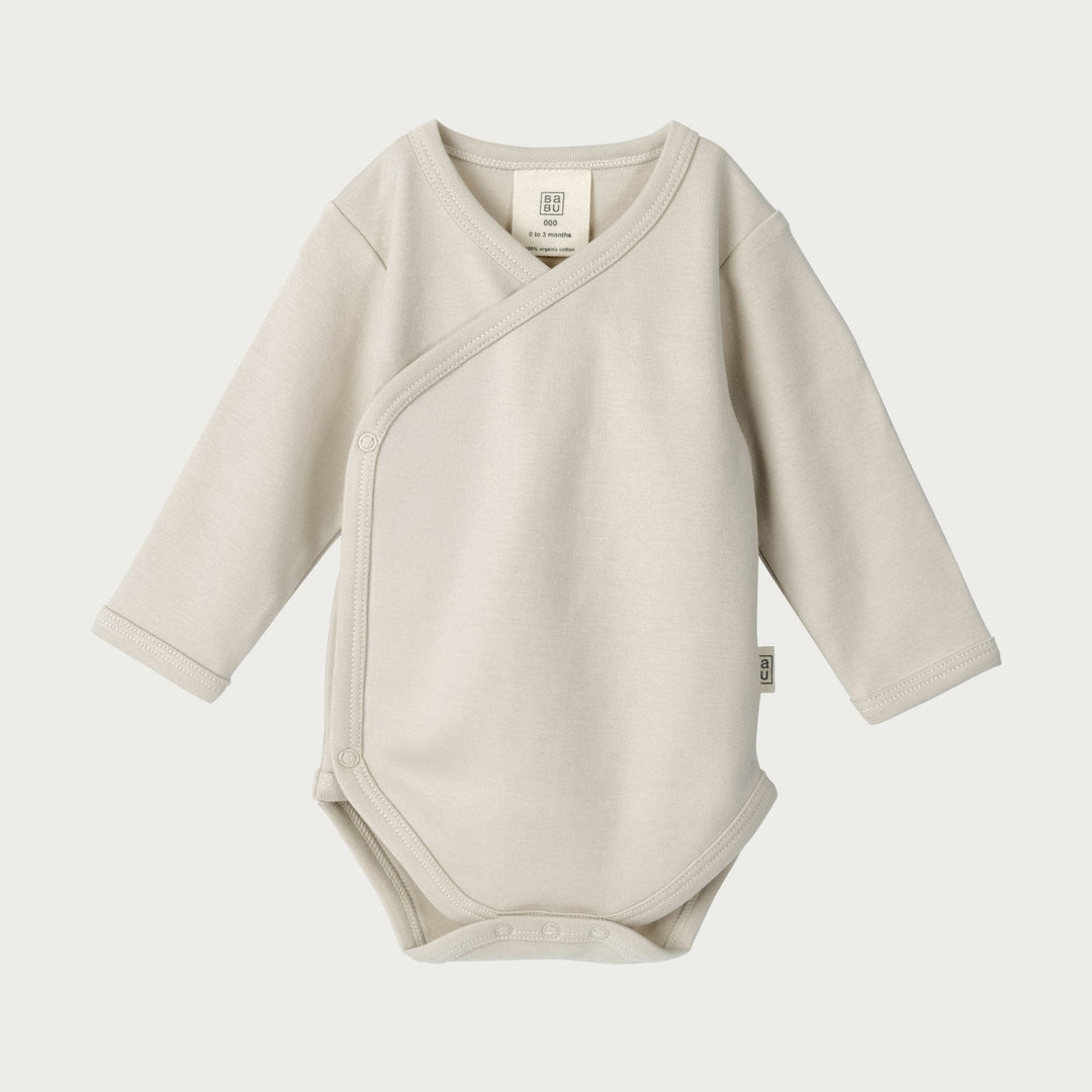 Babu kimono bodysuits are soft, breathable, and designed for easy dressing, a must-have for newborns. Made from premium organic cotton, it provides a gentle, cosy layer against delicate skin. Available from www.thecollectivenz.com