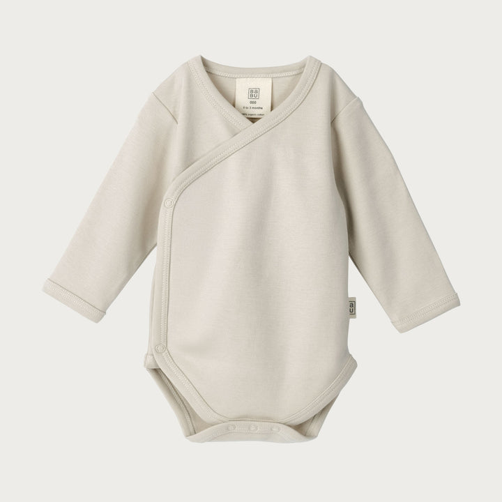Babu kimono bodysuits are soft, breathable, and designed for easy dressing, a must-have for newborns. Made from premium organic cotton, it provides a gentle, cosy layer against delicate skin. Available from www.thecollectivenz.com