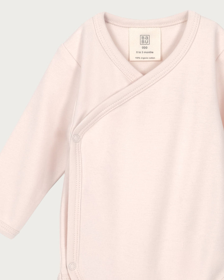 Babu kimono bodysuits are soft, breathable, and designed for easy dressing, a must-have for newborns. Made from premium organic cotton, it provides a gentle, cosy layer against delicate skin. Available from www.thecollectivenz.com