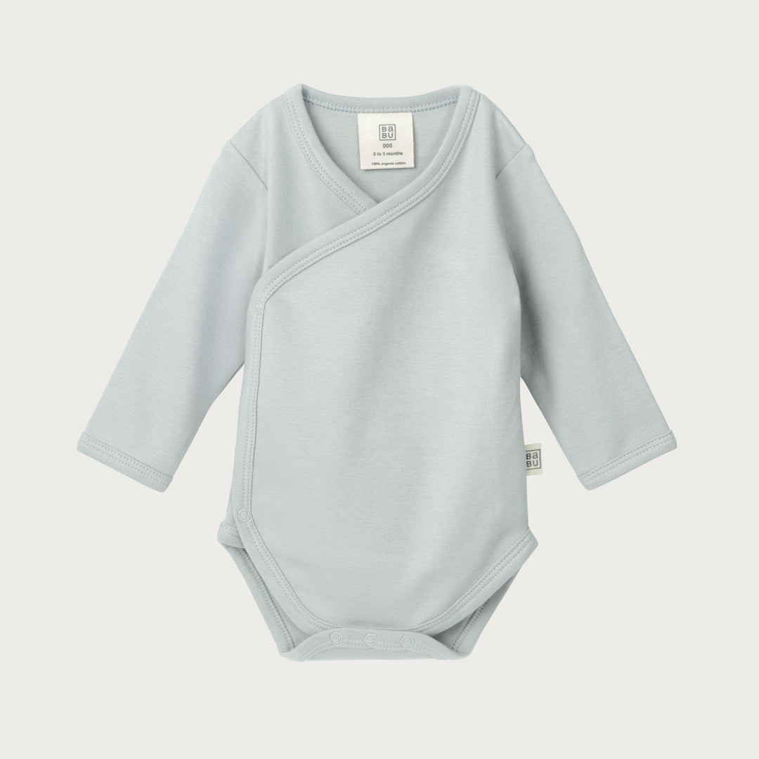 Babu kimono bodysuits are soft, breathable, and designed for easy dressing, a must-have for newborns. Made from premium organic cotton, it provides a gentle, cosy layer against delicate skin. Available from www.thecollectivenz.com
