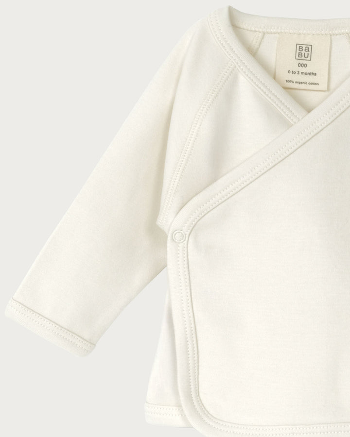 Soft, breathable, and thoughtfully designed for the early days. Our Kimono Cardigan is made from premium organic cotton — a gentle, lightweight layer that’s perfect for newborns when temperatures dip. Available from www.thecollectivenz.com