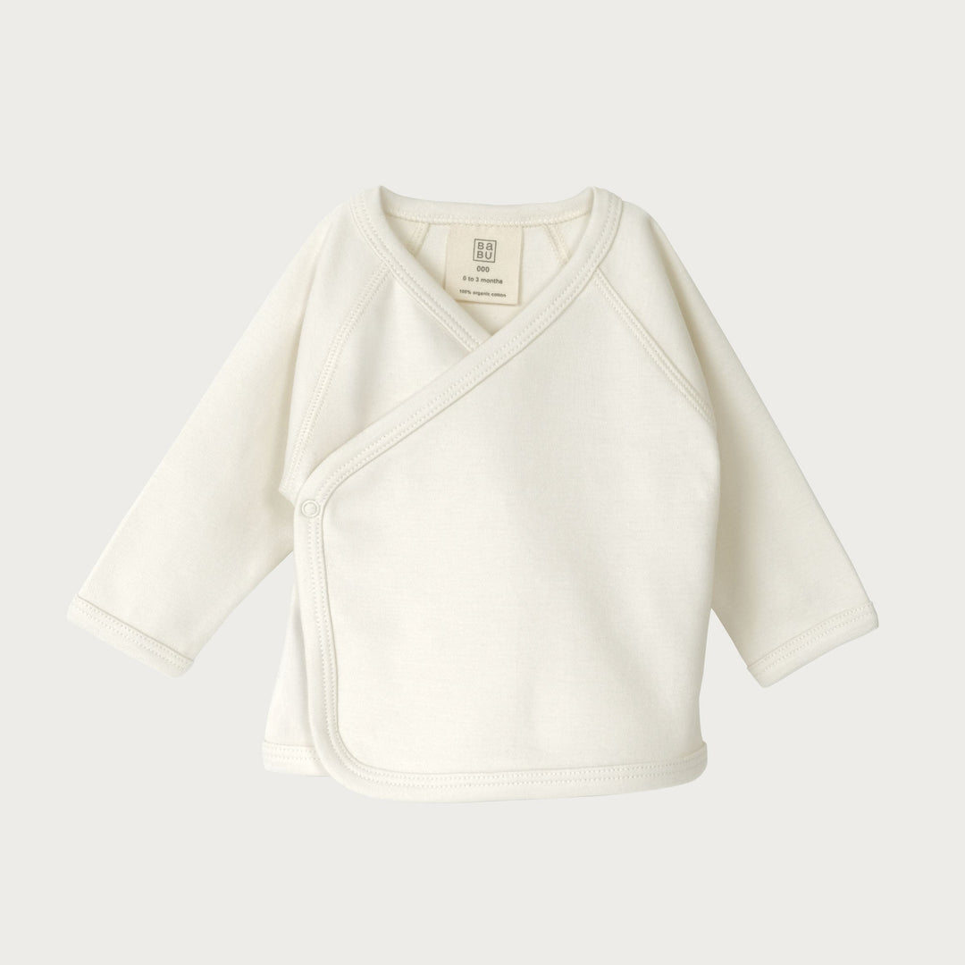 Soft, breathable, and thoughtfully designed for the early days. Our Kimono Cardigan is made from premium organic cotton — a gentle, lightweight layer that’s perfect for newborns when temperatures dip. Available from www.thecollectivenz.com