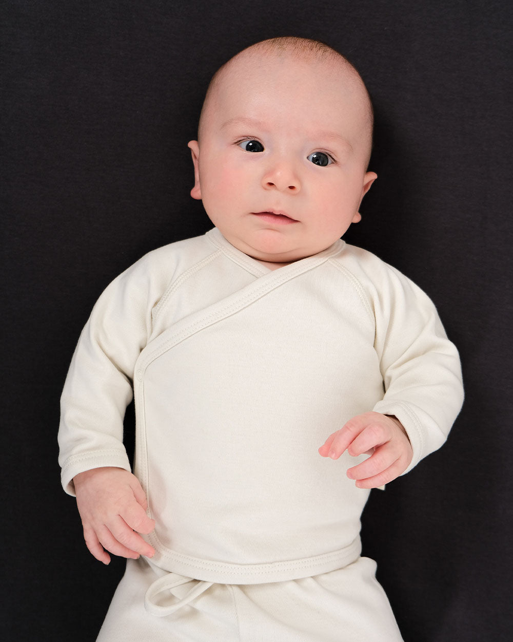 Soft, breathable, and thoughtfully designed for the early days. Our Kimono Cardigan is made from premium organic cotton — a gentle, lightweight layer that’s perfect for newborns when temperatures dip. Available from www.thecollectivenz.com