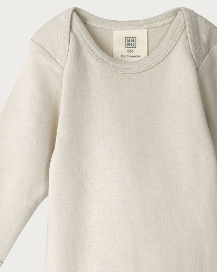 Organic Cotton Long Sleeve Bodysuit is a must-have for your baby's wardrobe. Made from super-soft organic cotton that's gentle on delicate skin, it’s perfect for sleeping and everyday wear, available from www.thecollectivenz.com