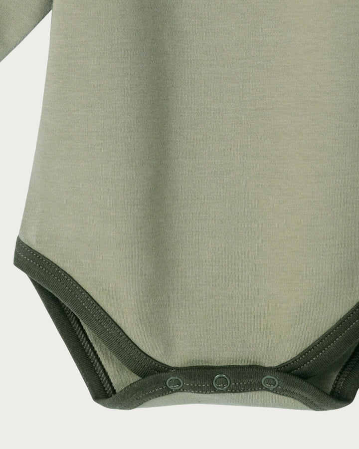 Babu bodysuits are soft, durable, and thoughtfully designed,  a must-have for your baby's wardrobe. Made from super-soft organic cotton that's gentle on delicate skin, it’s perfect for sleeping and everyday wear. Available from www.thecollectivenz.com