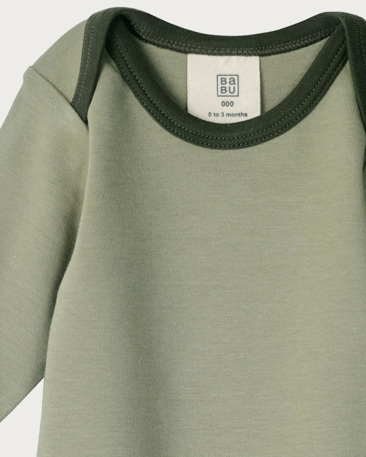 Babu bodysuits are soft, durable, and thoughtfully designed,  a must-have for your baby's wardrobe. Made from super-soft organic cotton that's gentle on delicate skin, it’s perfect for sleeping and everyday wear. Available from www.thecollectivenz.com