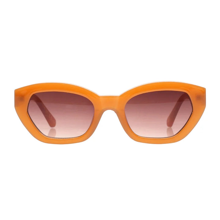 Cat-eye sunglasses with a translucent orange acetate frame and gradient brown lenses, shown against a plain white background.
