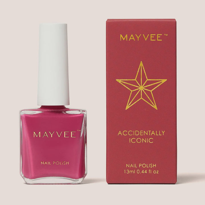 Mayvee nail polish bottle in a bright magenta shade next to its red packaging box with gold lettering and a star logo, on a light beige background.