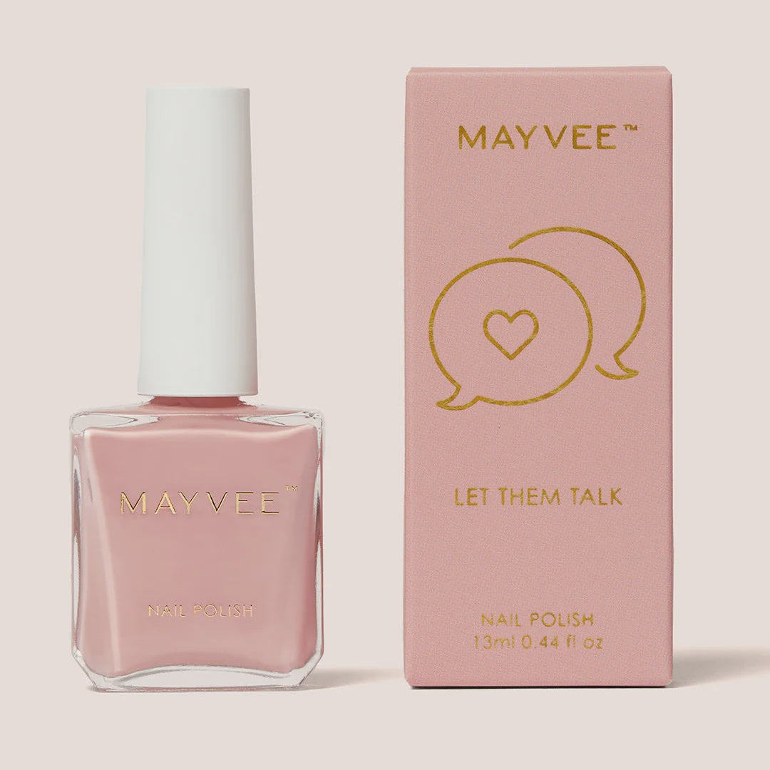 Mayvee nail polish bottle in a soft pink shade next to its matching pink packaging box with gold lettering, set against a solid light beige background.