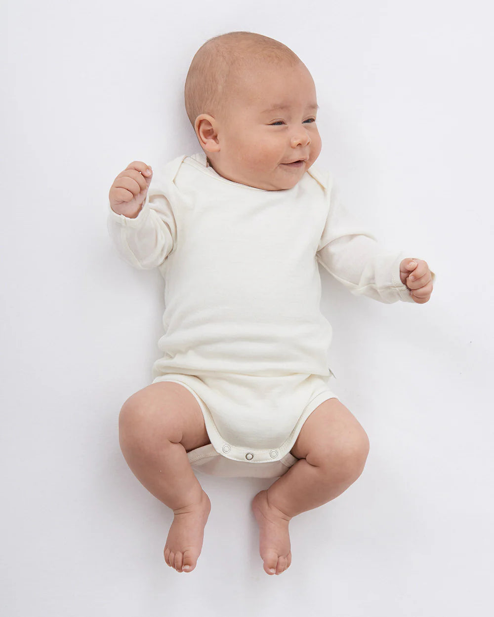 Babu Long-Sleeved Merino Bodysuit is an essential layette wardrobe staple available from www.thecollectivenz.com