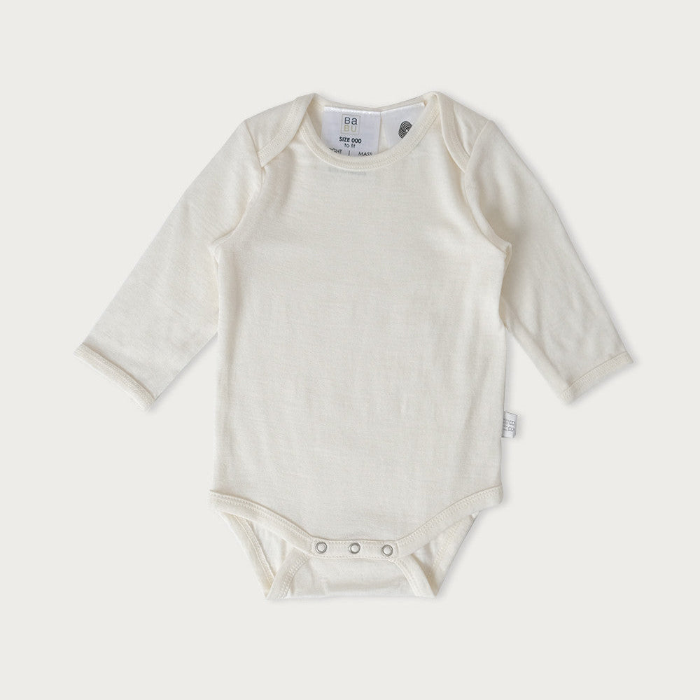 Babu Long-Sleeved Merino Bodysuit is an essential layette wardrobe staple available from www.thecollectivenz.com
