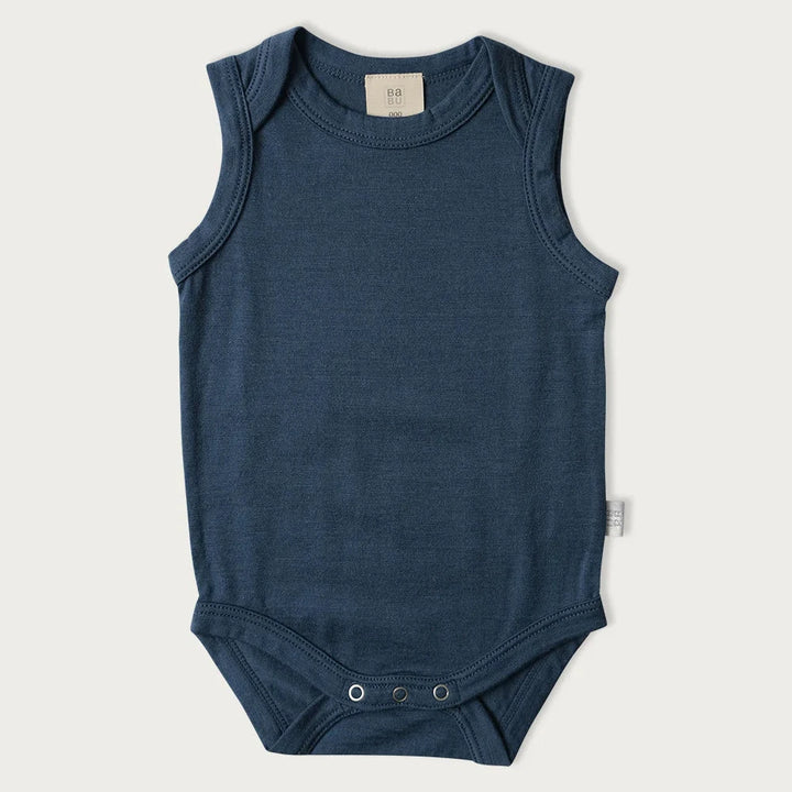 Merino Singlet Bodysuits are perfect for wearing on their own in the warmer months or for layering up in cooler seasons without restricting arm movement. Available from www.thecollectivenz.com