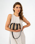 The Elms+King Monty Bag is made from premium recycled PU and features a pillowy body construction. Available from www.thecollectivenz.com