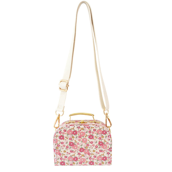 A fashionable cross body mini case in a sweet little floral print. The cutest size and adjustable strap. A cute perfect first bag for your little ones accessories collection. Available from www.thecollectivenz.com