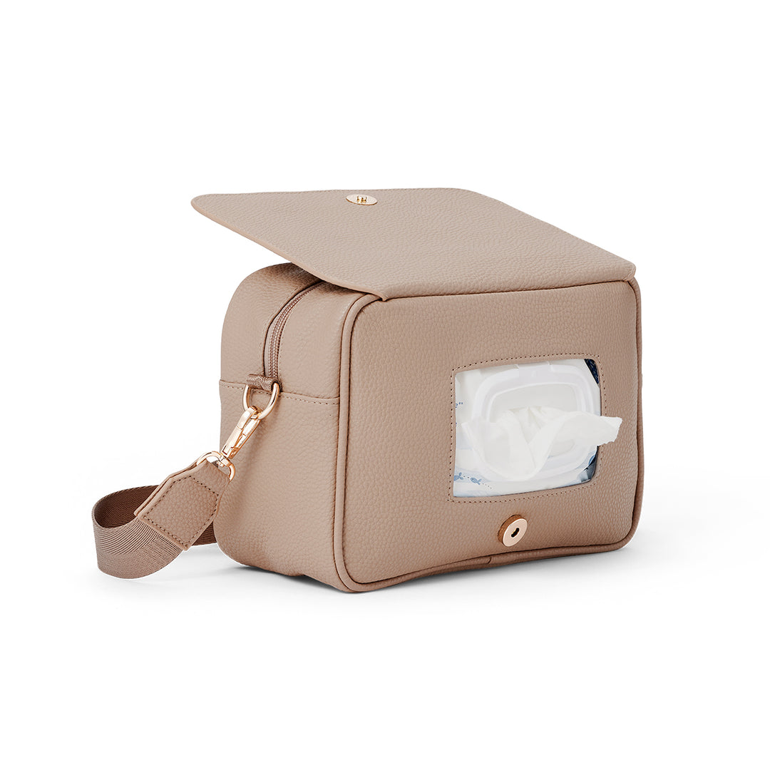 Pretty Brave beige diaper bag with a window showing tissues on a white background