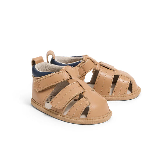 Pair of tan pretty brave baby sandals on a white background