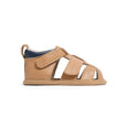 pretty brave Tan baby sandal with a white background