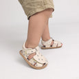 Children's pretty brave sandals with wave patterns on a light gray background