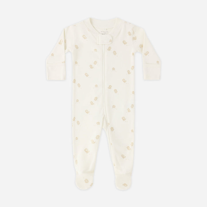 Baby onesie with small patterns on a white background