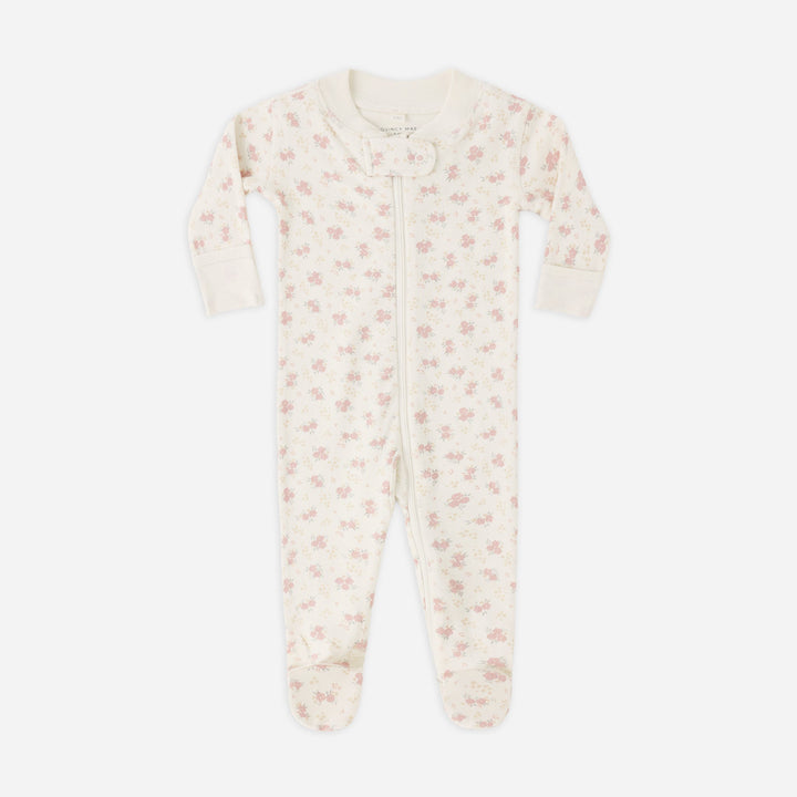 Baby onesie with floral pattern on a white background
