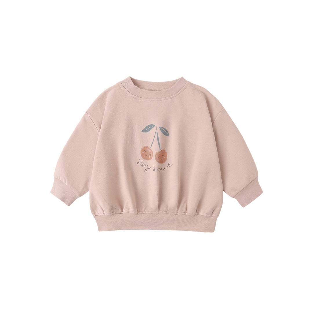 Pink sweatshirt with cherry design on a white background